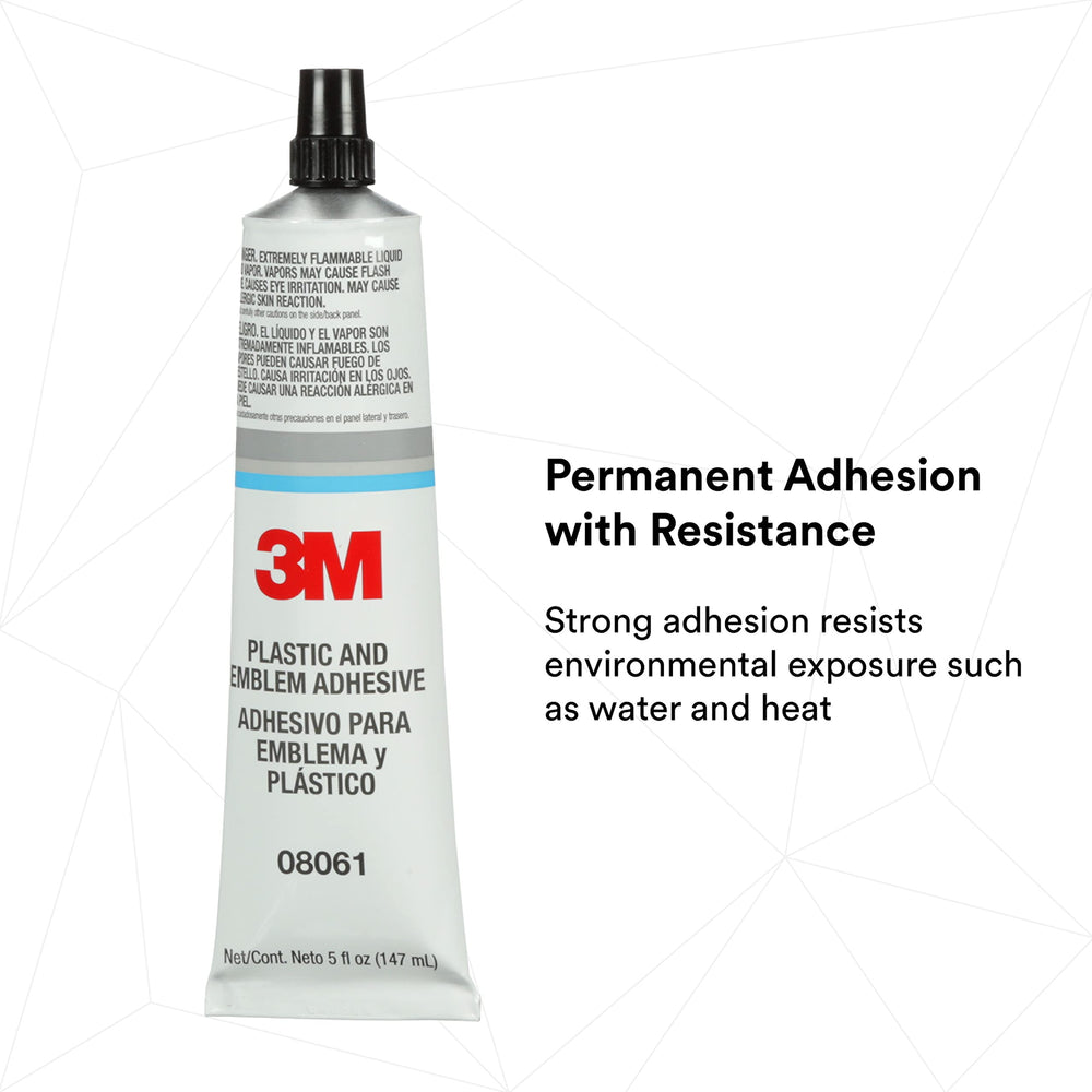 3M adhesive being applied to an automotive emblem for durable trim attachment