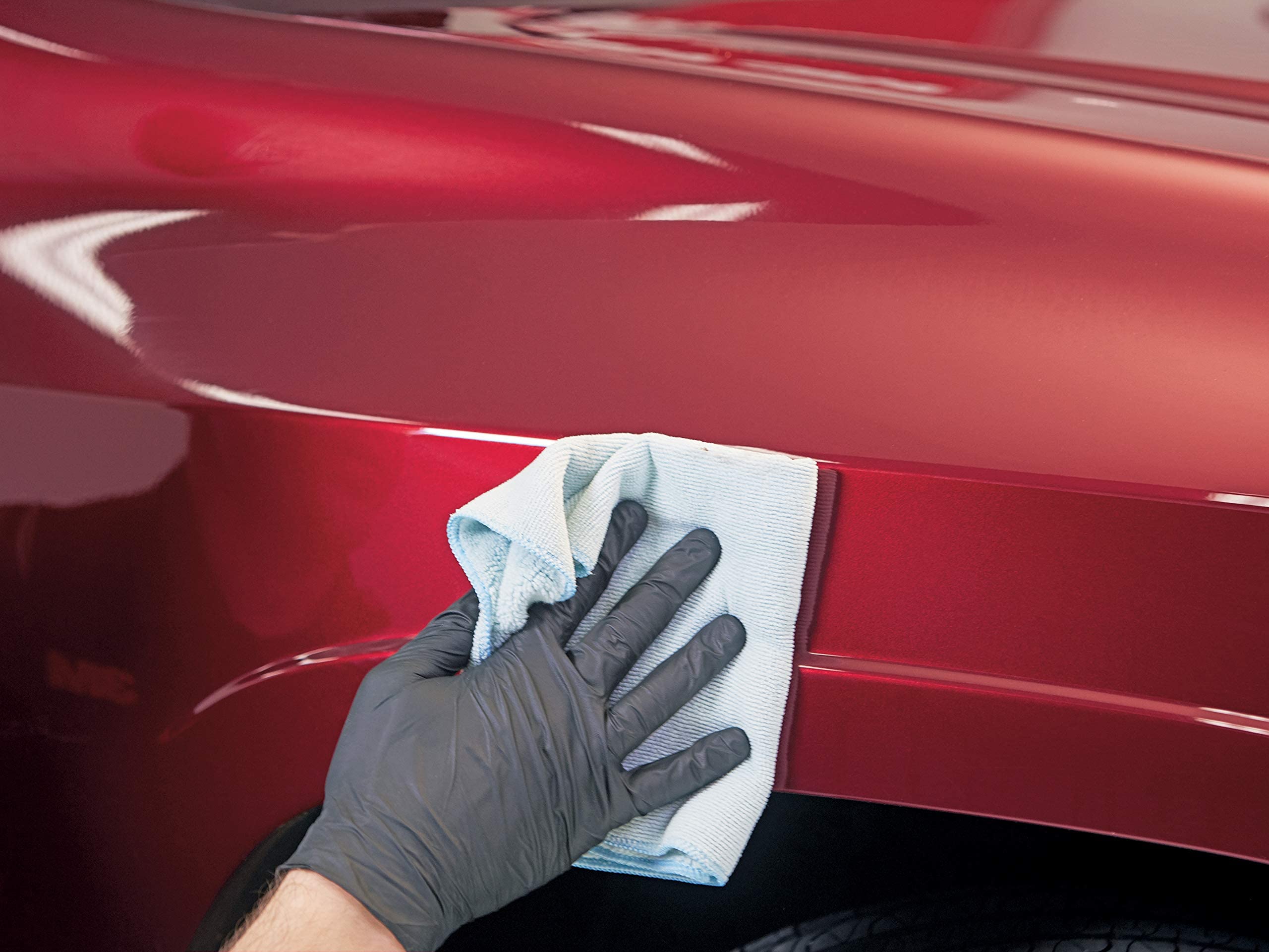 3M kit in use on car panel saving time on light scratches