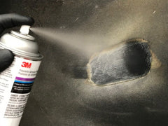 3M adhesion promoter being sprayed on TPO plastic, improving surface for stronger bonds