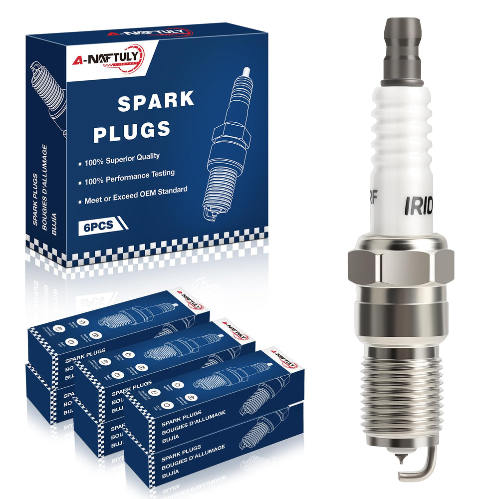 Garage workbench with A-NAFTULY plugs and service items suggesting practical maintenance setup