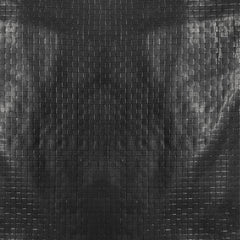 A.A close-up of woven HDPE with LDPE coating highlighting tear resistance benefit