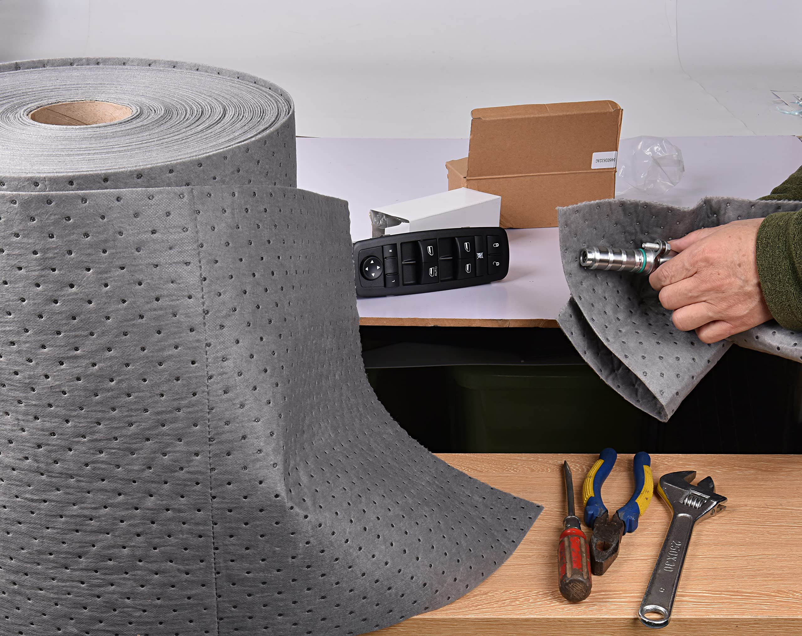 A A IN roll held in hand for scale, illustrating compact storage and portability