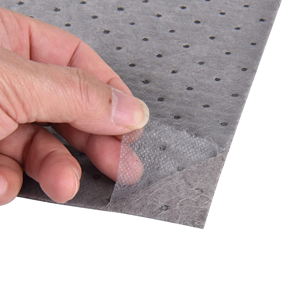 A A IN used pad soaking oil showing high absorption capacity and containment