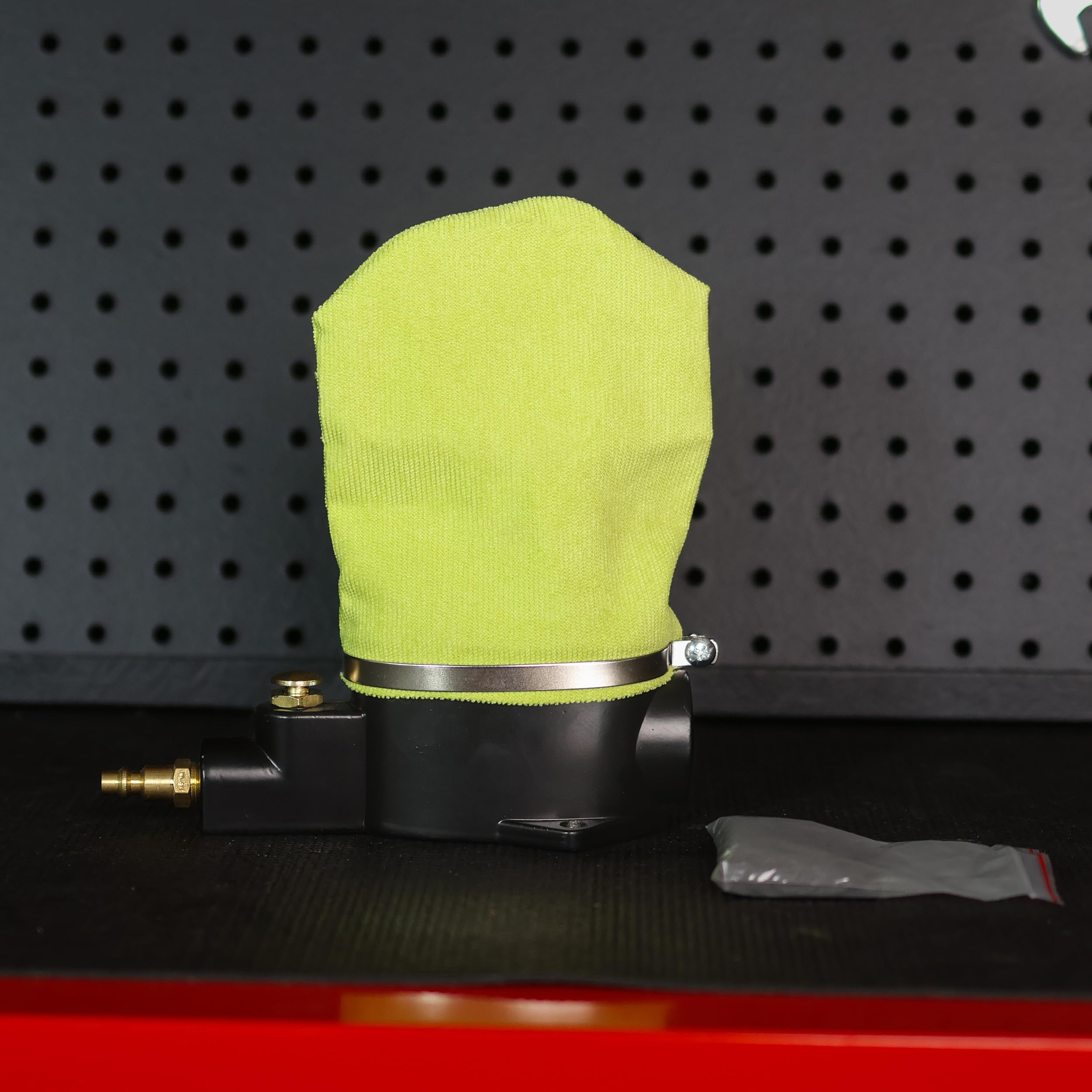 ABN in use with spark plug inserted showing gentle circular cleaning action benefit