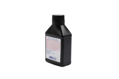 ACDelco 4 oz bottle beside gear for scale demonstrating compact convenience