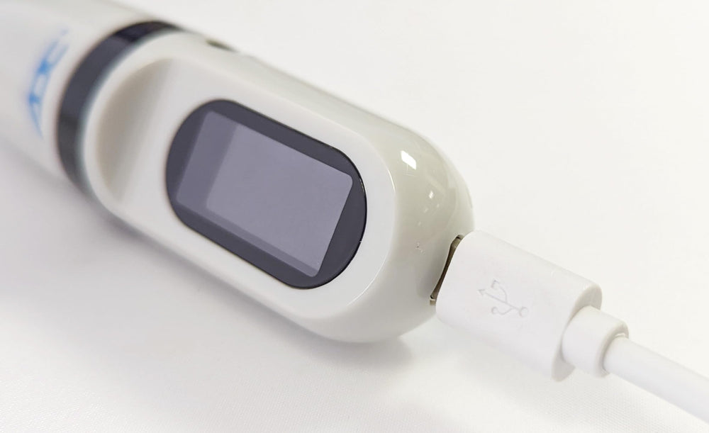 ADC Adtemp‑Mini 432 with micro USB cable included to show rechargeable benefit