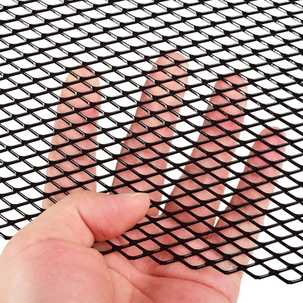 AggAuto close-up of 6x12mm rhombic mesh texture providing debris protection