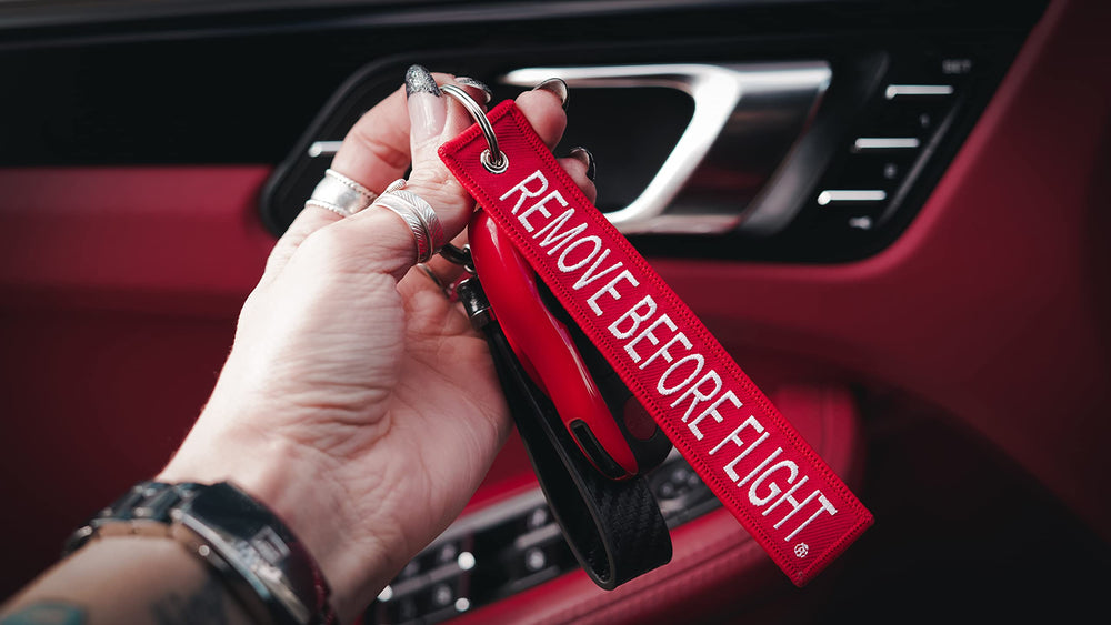 AIXEPA double-sided text display showing readable remove before flight message both sides