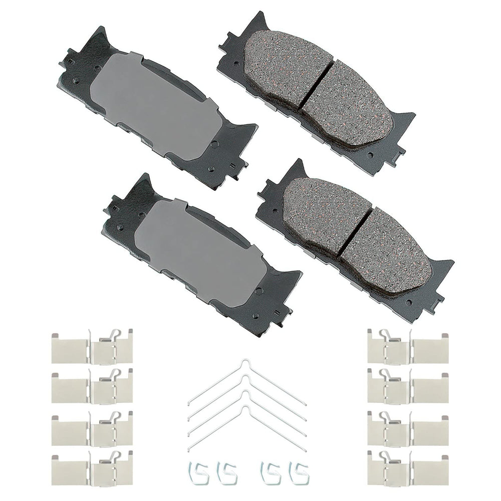 Akebono ACT1222A pad thickness close-up displaying 17.3 mm ceramic material for durability