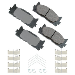 Akebono ACT1222A pad thickness close-up displaying 17.3 mm ceramic material for durability