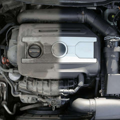 Akfix A115 spraying onto greasy engine parts to quickly loosen grime and oil