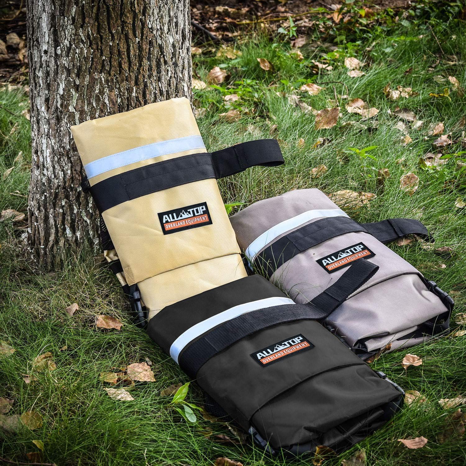 ALL-TOP bag mounted on truck spare tire in outdoor setting for tidy cargo storage