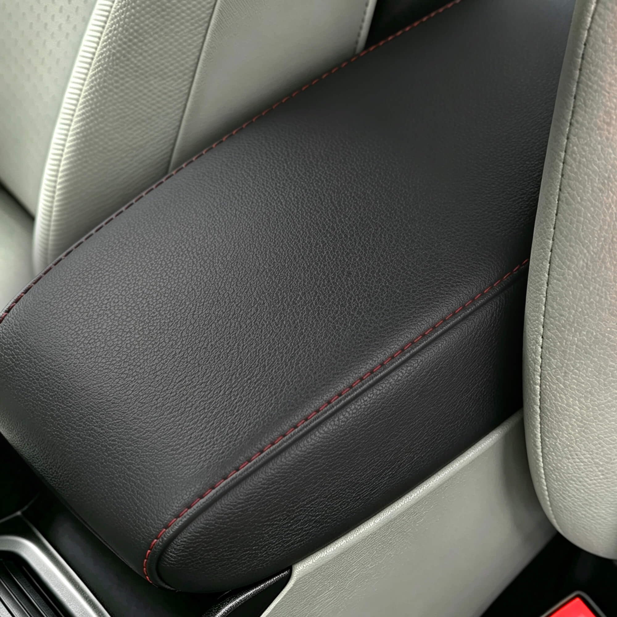AOMSAZTO closeup of red stitching highlighting durable finish