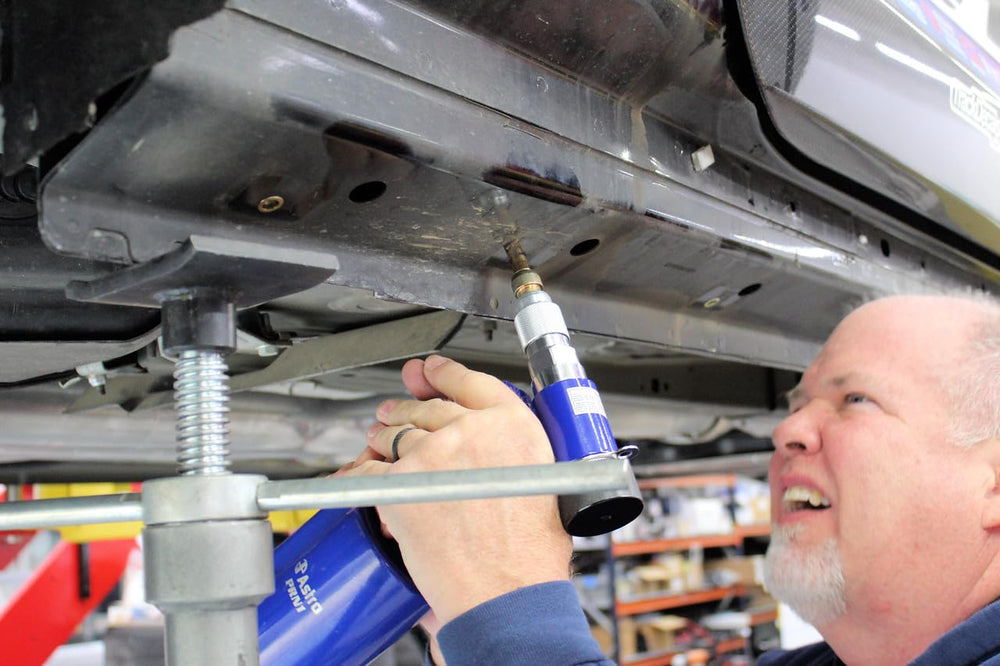 AP Astro PRN1 setting a rivet nut in a vehicle panel demonstrating quick shop use