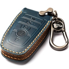 APEKUU key shell held in hand showing compact size and grip