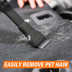 Armor All vacuum in use on car seat demonstrating quick removal of crumbs and pet hair