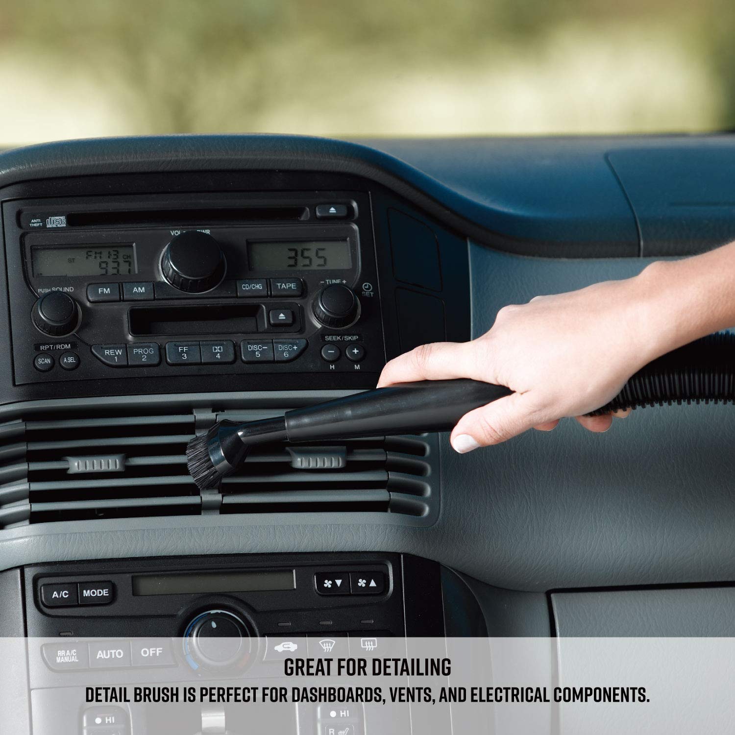 Armor All AA255 vacuuming car interior showing deep-cleaning of seats and carpet