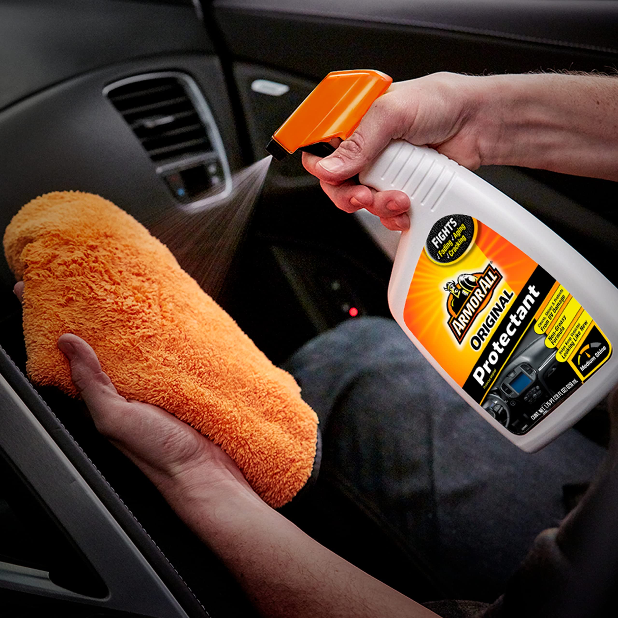 Armor All applied to dashboard restoring rich look and UV protection