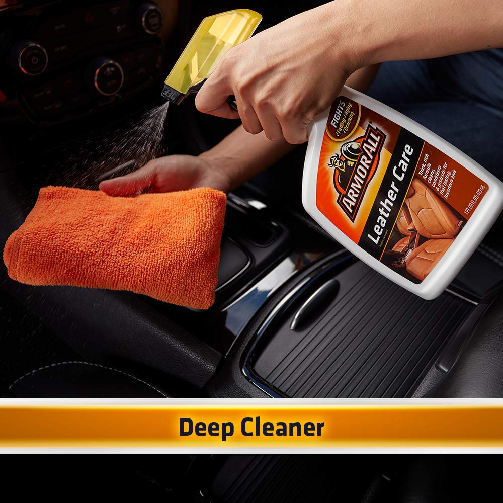 Armor All being applied to a car seat to condition and soften leather