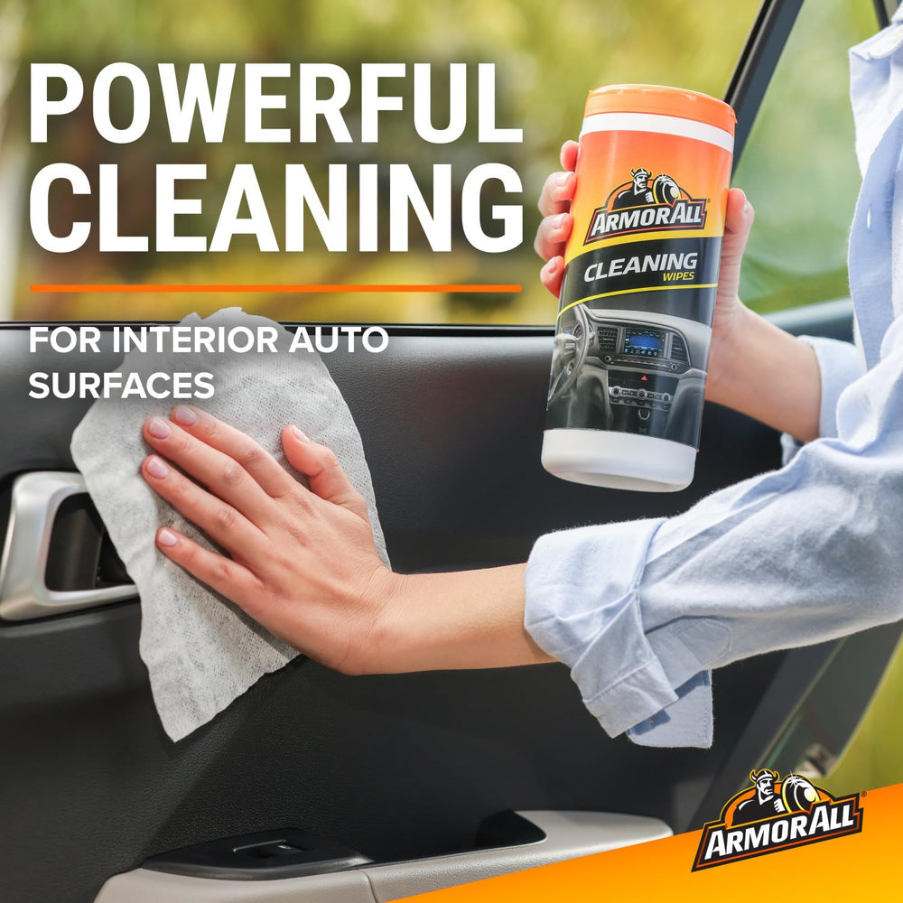 Armor All wipe cleaning dashboard revealing dust-free, natural finish