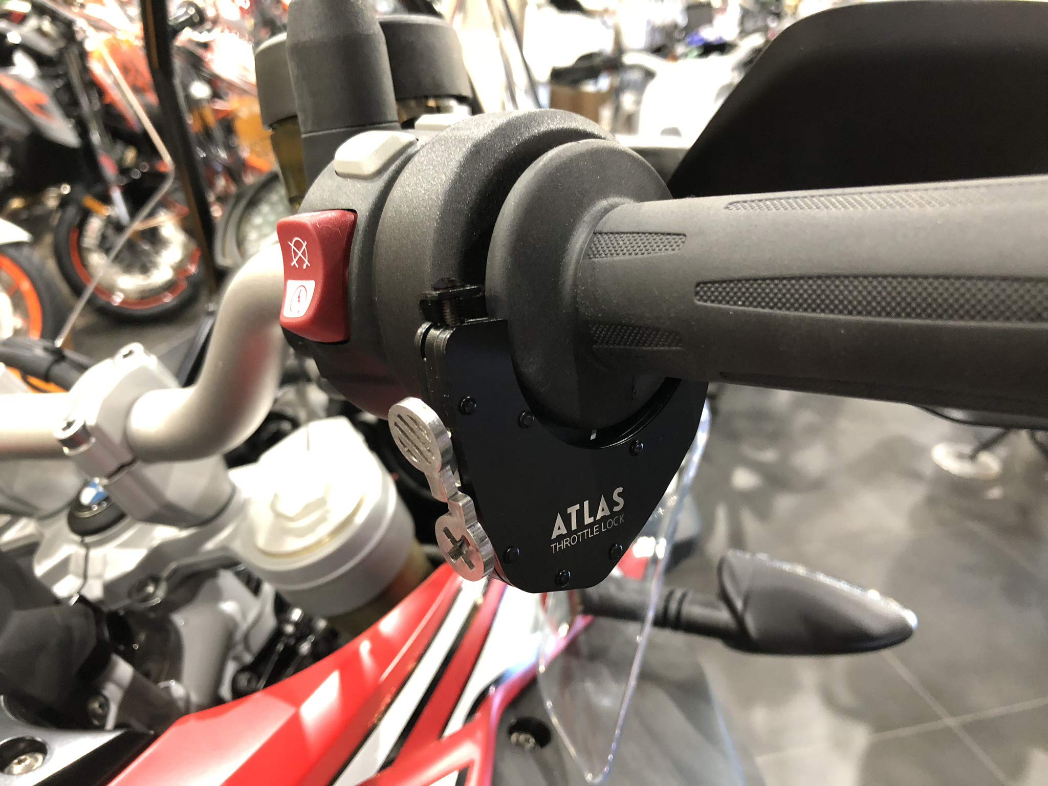 ATLAS Throttle Lock used by rider on highway reducing wrist fatigue during long rides