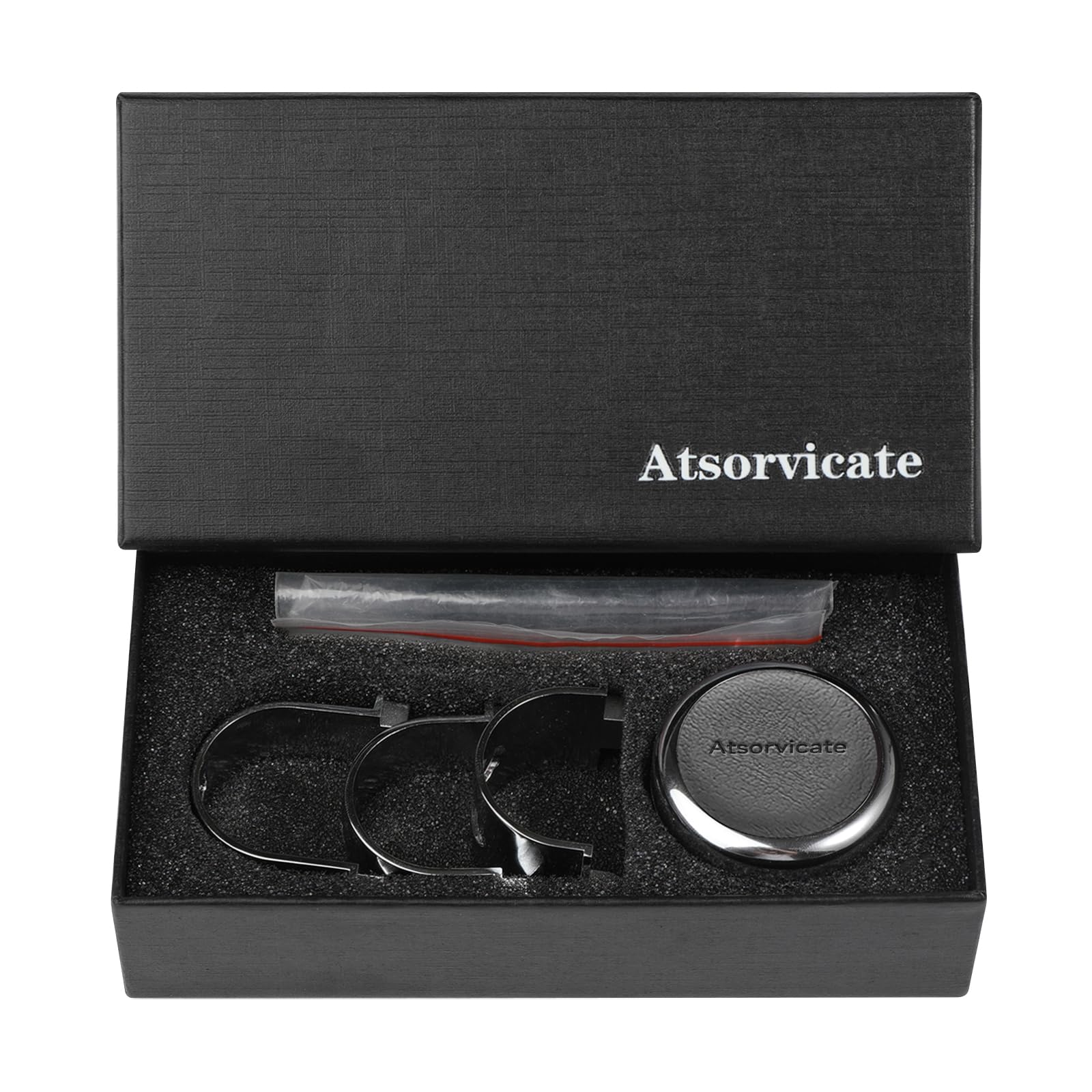 Atsorvicate on steering wheel at night highlighting reflective safety visibility