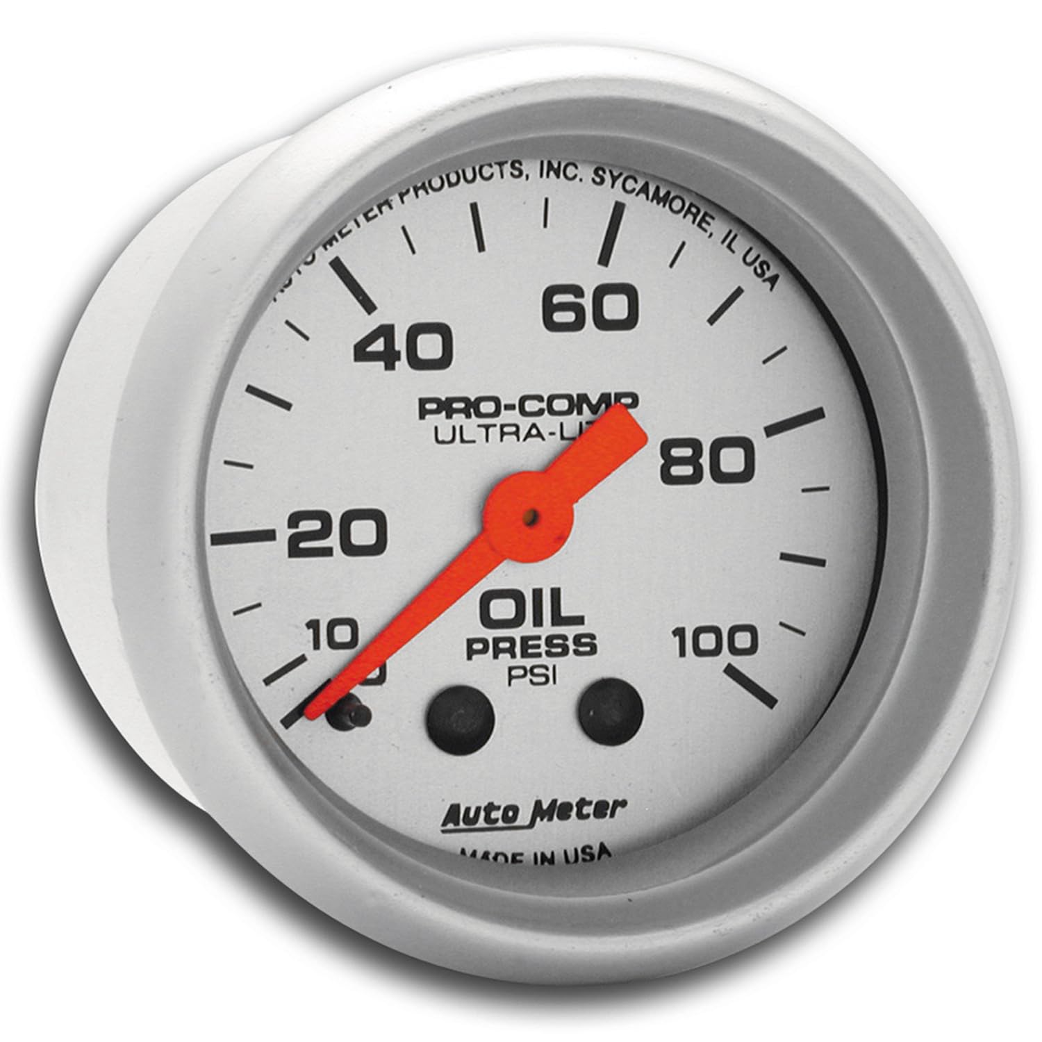 AUTO METER close-up of orange pointer and silver dial highlighting precise readability