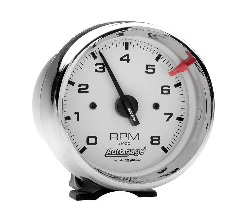 AUTO METER white-face tachometer front view shows clear dial for quick RPM reading