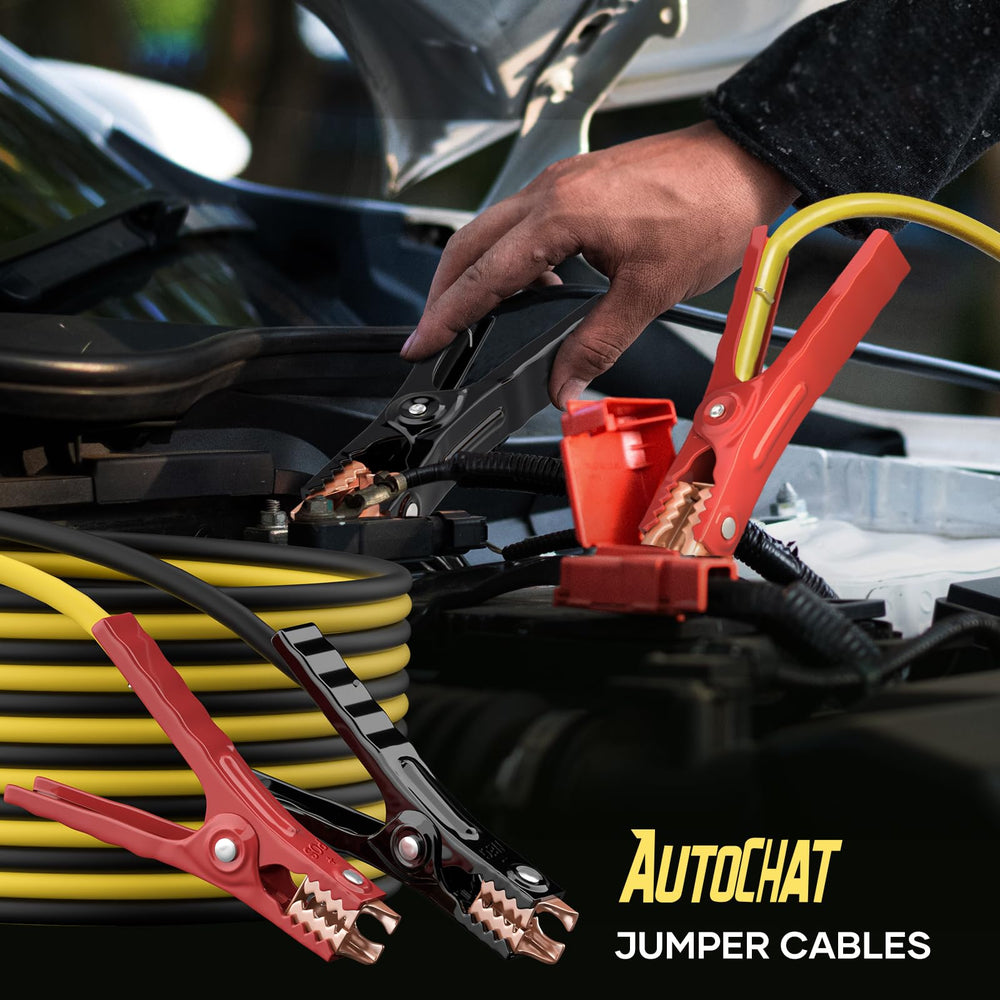 AutoChat cables connected between two parked SUV batteries for quick start