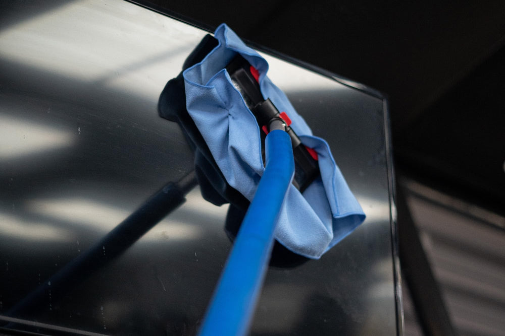 Autofiber quick-release towel-grip plugs securing a microfiber towel for streak-free wiping