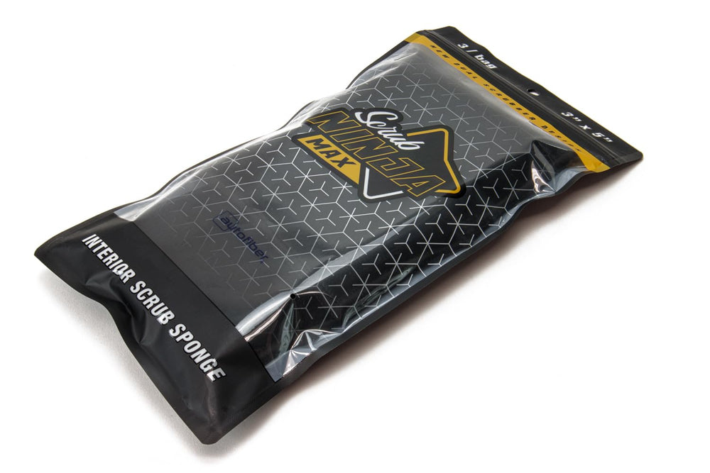 Autofiber sponge in use on dashboard showing safe effective grime removal