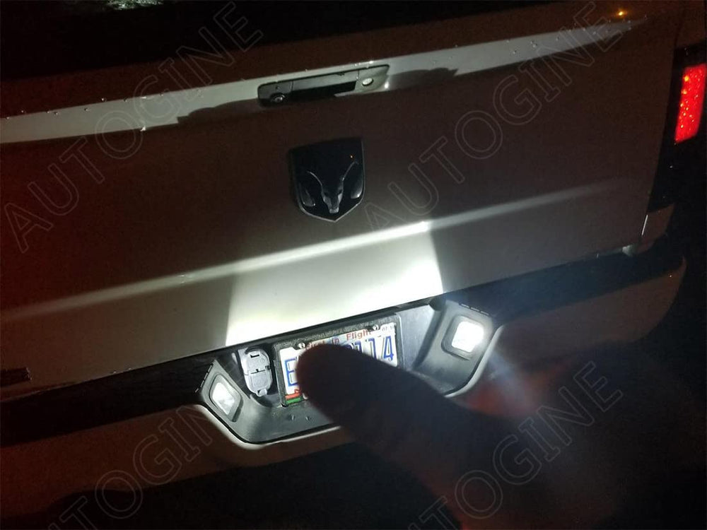 AUTOGINE bulbs next to Ram interior for size and fitment reassurance