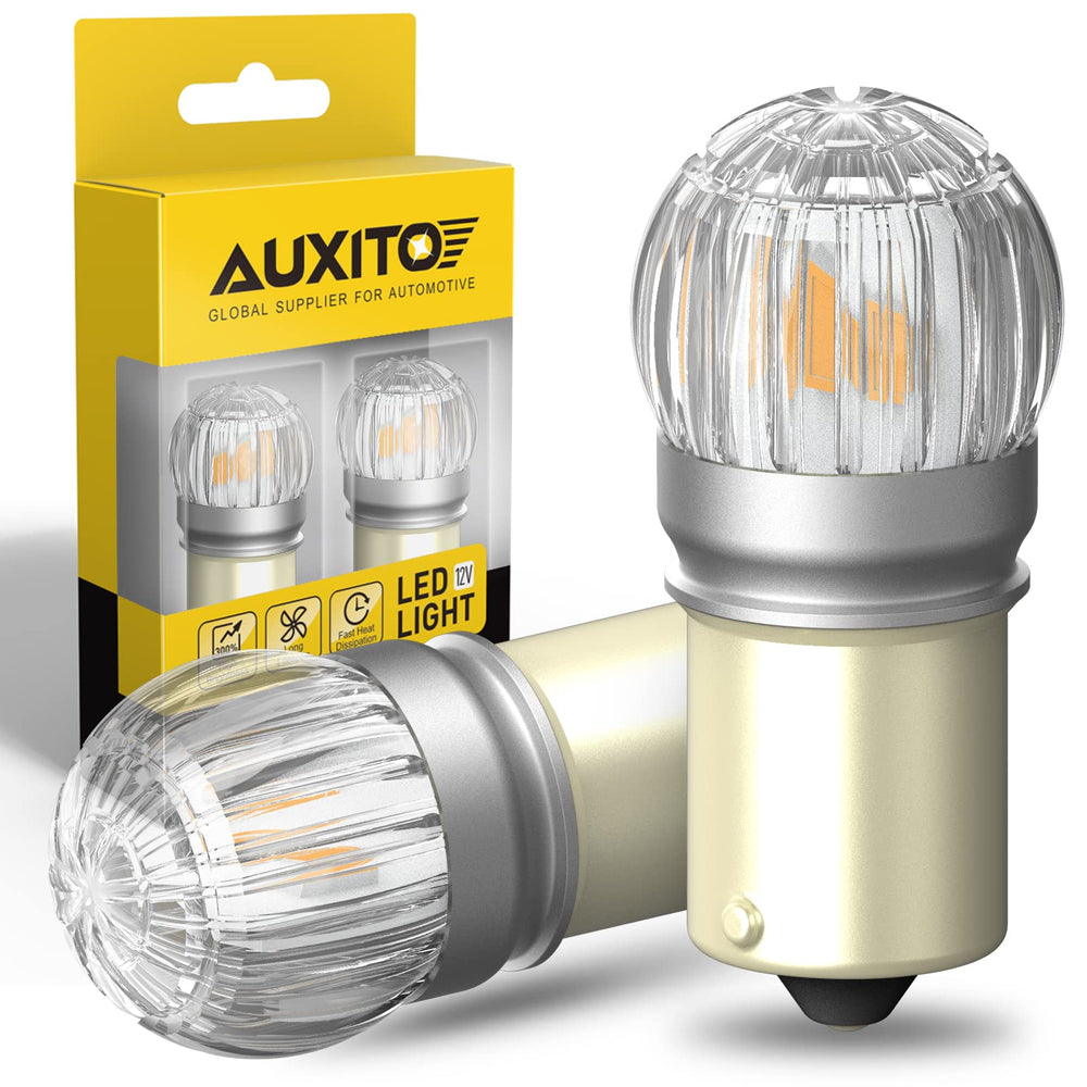 AUXITO 1157 amber bulb front view showing bright amber output and improved visibility