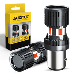 AUXITO 1157 red bulb front view showing bright lens and metal housing for clear signaling