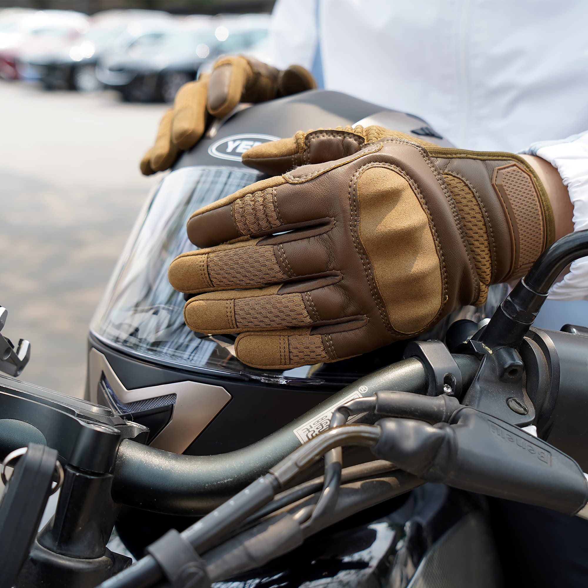 AXBXCX gloves worn by cyclist, provides grip and control on handlebars