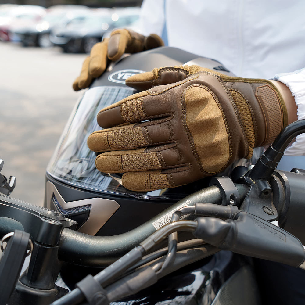 AXBXCX gloves worn by cyclist, provides grip and control on handlebars