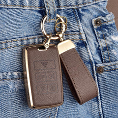 Axtrulix fitted key showing button access and preserved usability benefit