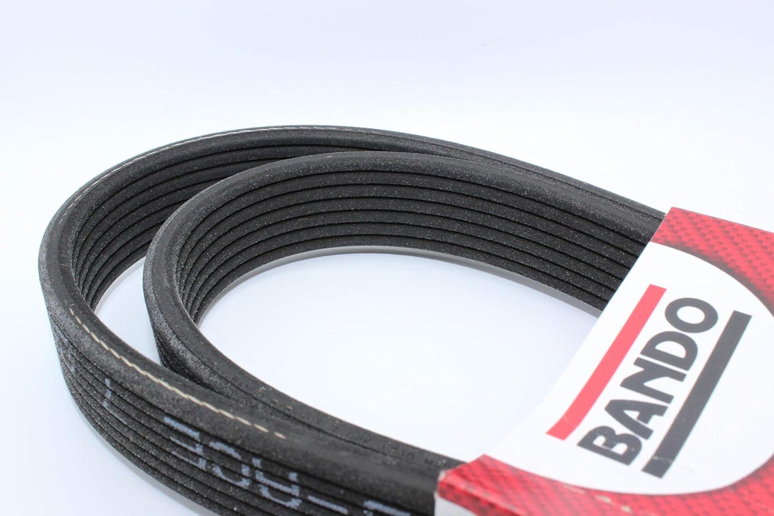 Bando USA belt next to ruler and label showing accurate sizing