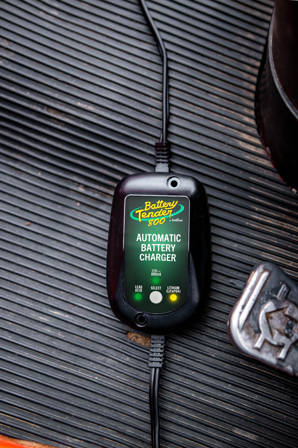 Battery Tender mounted on ATV demonstrating secure outdoor mounting and vibration resistance benefit