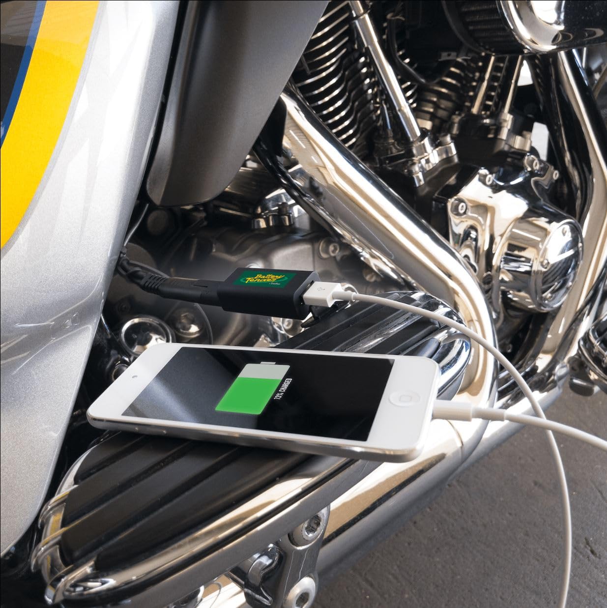 Battery Tender adapter plugged into motorcycle SAE connector delivering convenient power