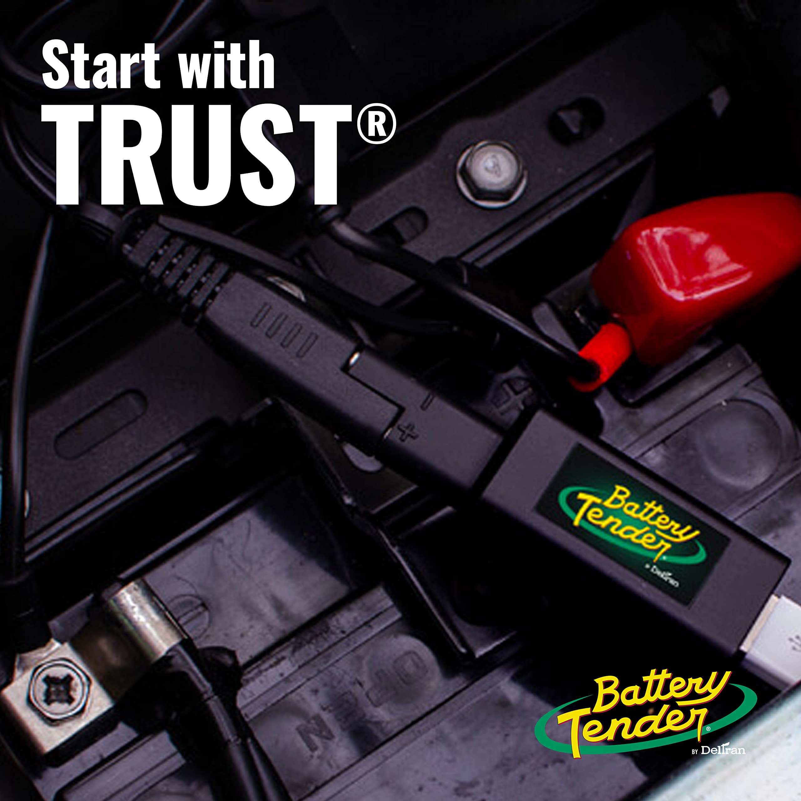 Battery Tender extension in a workshop with tools showing organized charging setup benefit