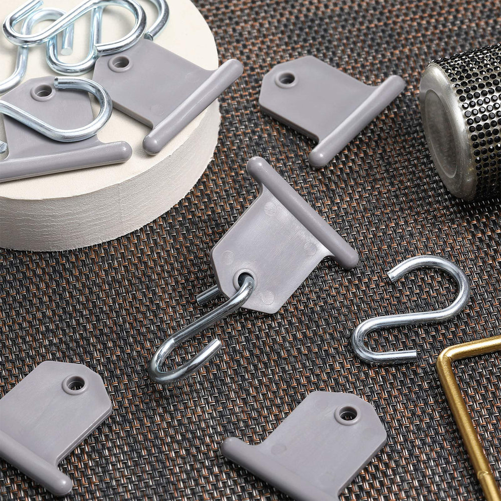 BBTO hooks beside ruler and coin to show compact scale and fit
