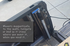 Bed Buddi retracted on truck bed demonstrating compact storage benefit