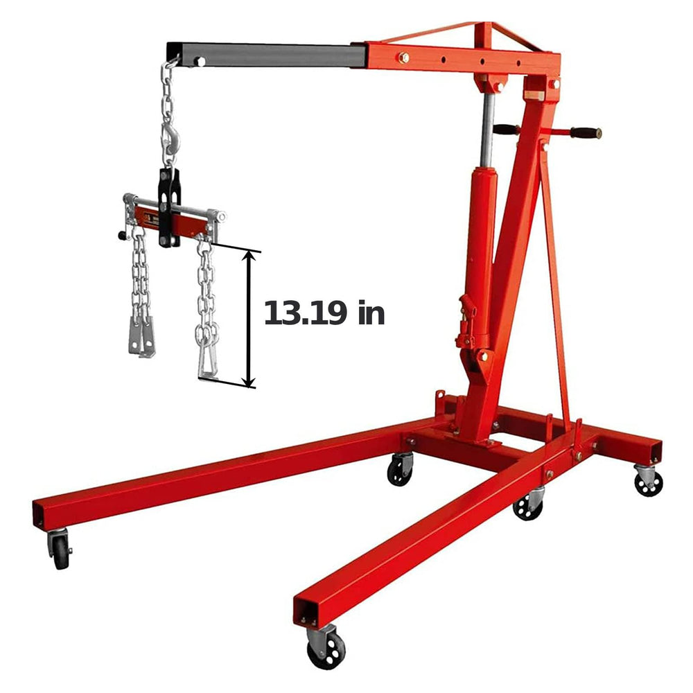 Big RED in a workshop lifting an engine to illustrate faster installation