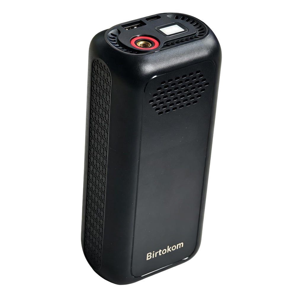Birtokom inflator in car trunk during road trip illustrating travel readiness