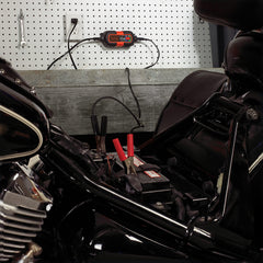 BLACK+DECKER BM3B mounted on garage wall using bracket for organized long-term maintenance