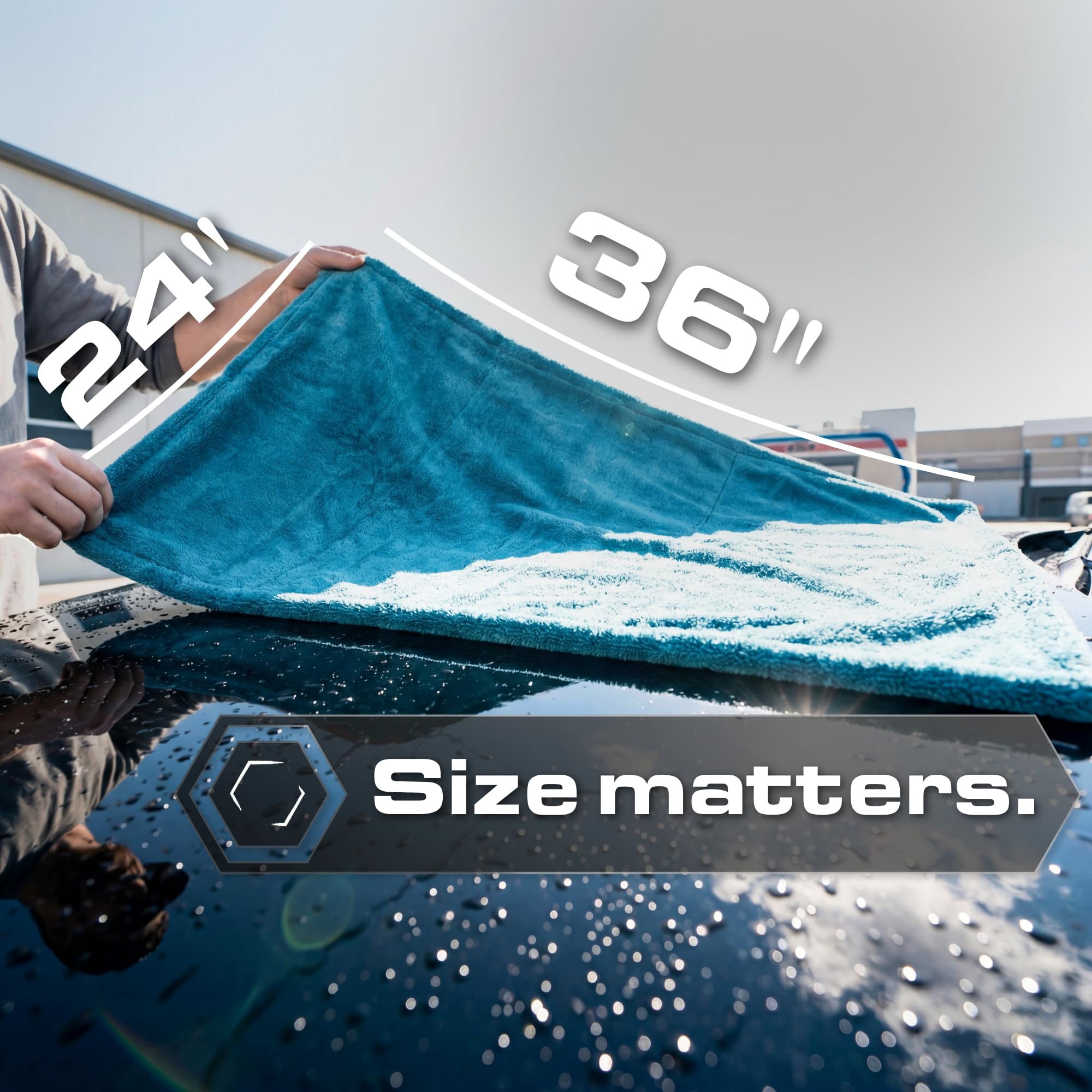 Blackline towel next to car key illustrating 24x36 inch scale and convenience