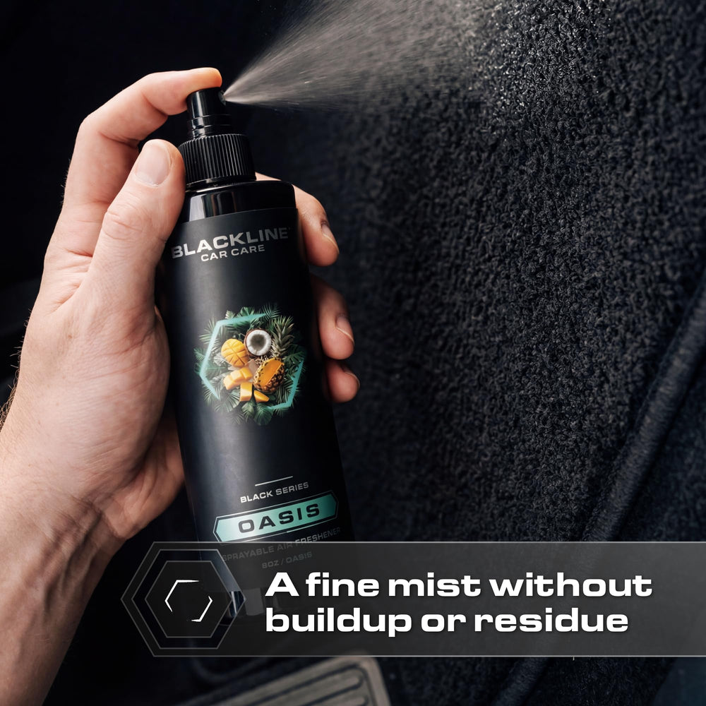 Blackline Wild Cherry bottle in hand demonstrating portable travel-friendly size