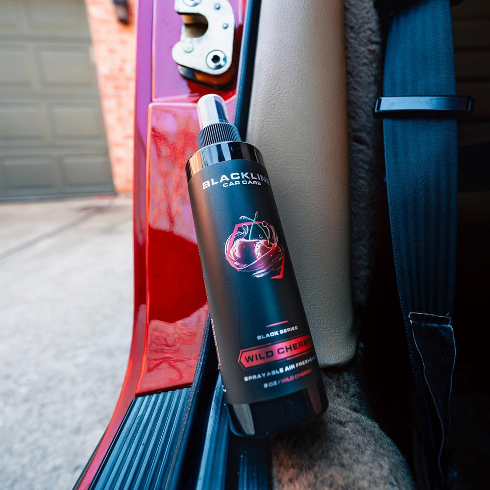 Blackline Wild Cherry spray action releasing freshening mist for quick odor removal