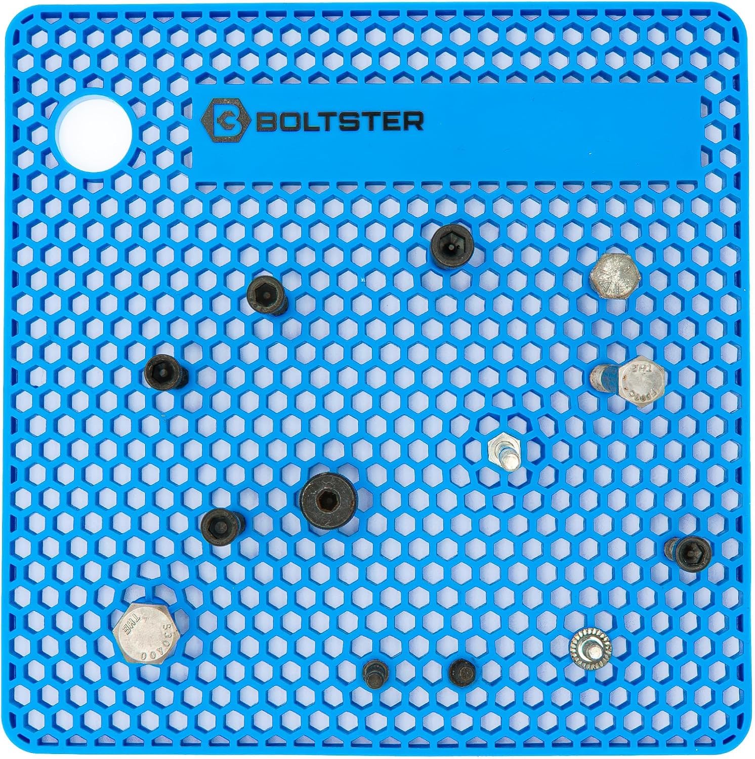 Boltster beside ruler showing large-format size to hold engine fasteners